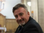 Image of Priests in Iraq replace sadness with joy.