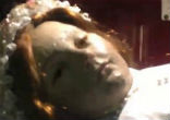 Image of Child saint recorded blinking her eyes 300 years after death (Obscura habitacion/YouTube).