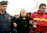 Image of A Romanian woman claiming to be possessed finds peace before a Saint's relic (CEN).