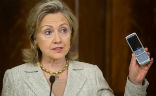 Image of Clinton and the White House worked together to manage her email scandal. 