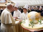 Image of Pope Francis was given a globe adorned with olive branches. 