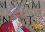 Image of Pope Francis reads his Palm Sunday homily during mass.