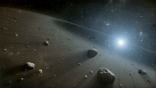 Image of Earth is close to the center of a cosmic shooting gallery, and sooner or later, we will be hit.
