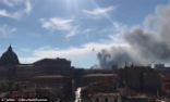 Image of Smoke was reported over the Vatican today. The cause is a garage fire near the walls of the city state.