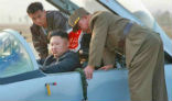 Image of Kim Jong Un sits in the cockpit of a MiG 29 'Fulcrum' fighter. 
