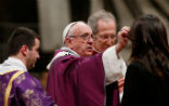 Image of Pope Francis distributes ashes to missionaries during a special Ash Wednesday Mass.