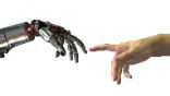 Image of We cannot get automated checkstands to think past unexpected items in bagging areas, so we still have a long way to go before we turn computers into gods. 