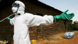 Image of A worker is disinfected after clearing a house of a plague victim. There are inconclusive reports the disease can kill within three hours. Such fast-killing diseases typically burn themselves out before they can spread far. The WHO has sent 1.2 million doses of antibiotics to the region. 